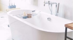 white porcelain bathtub situated in a bathroom