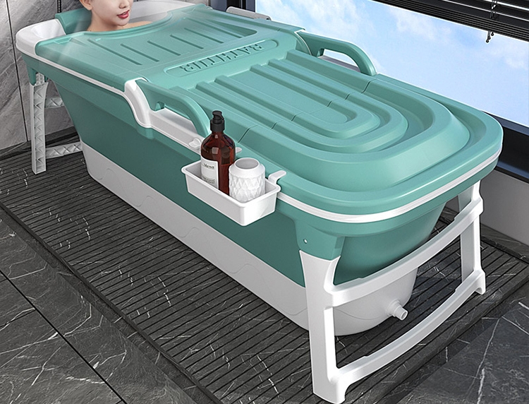 green portable bathtub with cover